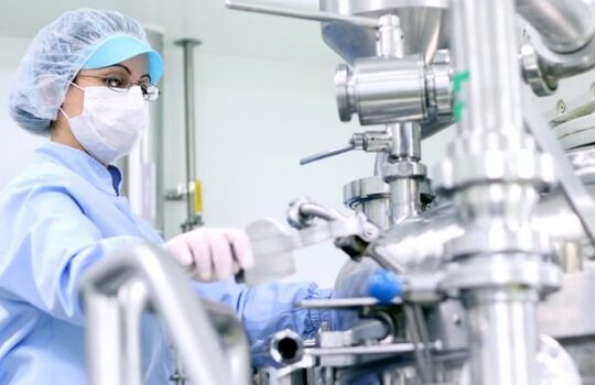 Preparing machine for work in pharmaceutical factory.